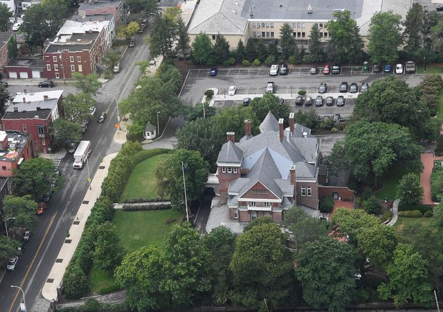 An aerial photograph of the Governor's mansion, with a U-Haul van seen on the street